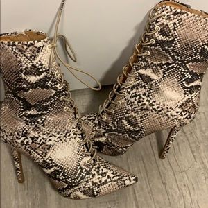 Qupid snake print lace up  booties